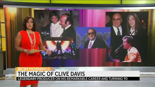 Clive Davis Net Worth, Age, Wife, and Family, news anchor with red clothes explaining his life series